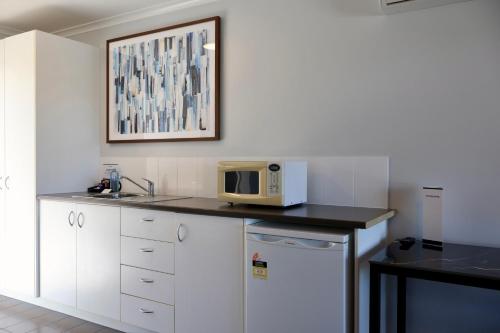 virtuve, Victory Hotel Motel Gympie in Victory Heights