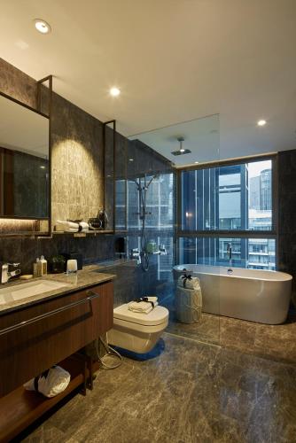 Bathroom, Ascott Orchard Singapore near Mount Elizabeth Hospital