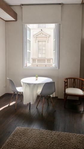 Habitación con balcón en el corazón de la ciudad