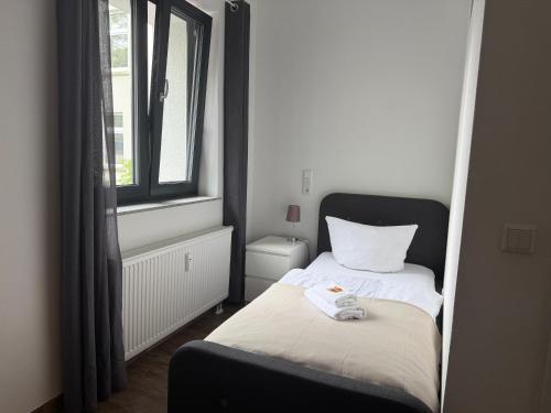 BIELEFELD CITY APARTMENTS - komfortable Einzelzimmer und Doppelzimmer - moderne Badezimmer, schnelles WLAN, Self-Check-In in Bielefeld, Deutschland