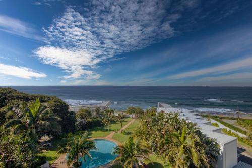Stylish Umdloti beach flat, pool & sea views – khách sạn tại La Mercy