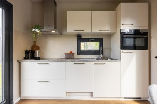 Tiny house by the water in Oud Ade - Tuin van Keet - 25 in Leiderdorp