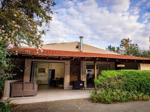 Vista exterior, Pinewood Cottages in Lanseria
