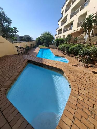 Úszómedence, Umhlanga Beachfront Self Catering 6 Cormoran in Umhlanga Rocks