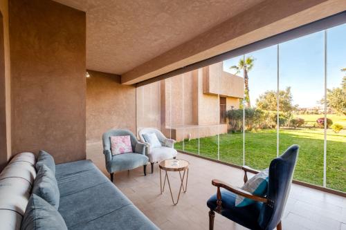 Vue au bord de la piscine Cafe Netflix Appartement Prestigia 2 chambres - image 13