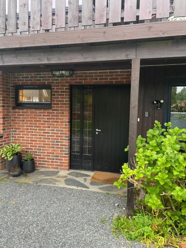 Sjarmerende retrohus nær Dyreparken – khách sạn tại Dvergsnes