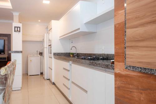 Apartamento com piscina e vista para montanha - image 5