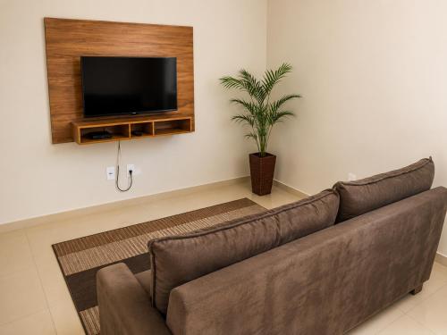 Koplietošanas atpūtas telpa ar TV, Casa Duplex Esperança - Ar e Garagem Privativa (Casa Duplex Esperanca - Ar e Garagem Privativa) in Bom Jesus da Lapa