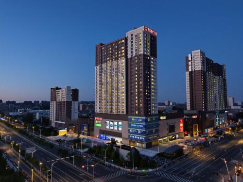 Shanghai Suju Service Apartment Pudong Wanda Plaza Zhoupu Subway Station Branch – khách sạn tại Khu du lịch nghỉ mát Q'tế Thượng Hải và Disneyland