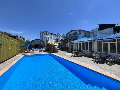 Exterior view of Laguna Boutique Hotel Bazaleti Lake