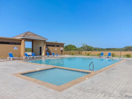 Barefoot Bliss Short Term Rental with pool in Colbeck Manor in Claremont