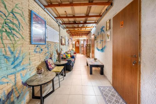 Shared lounge/TV area, The Lowest Place on Earth B&B in South Dead Sea
