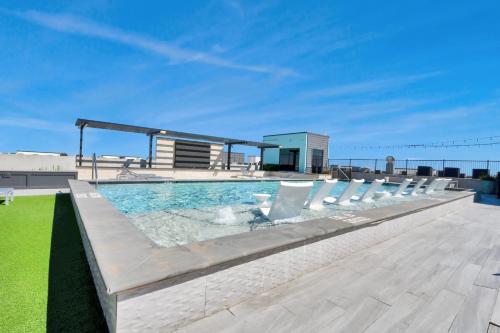Houston Luxury Apartment Features a rooftop pool city views and king-size beds in Houston