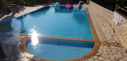 Family 2BR Gouvia – Apt 7 chambre d'hôte Evropoúloi