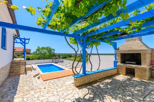 Exterior view of Villa Umag Istria seaview private pool and garage by Rentistra
