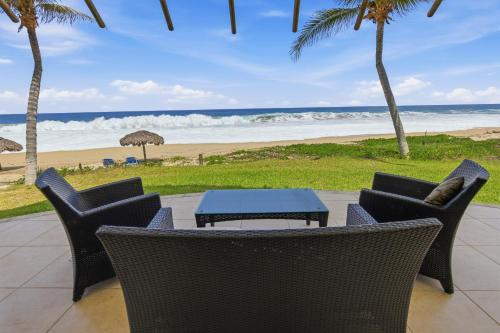 Beachfront Vacation Condos, Palmarito Beach, Vivo Resorts in Chano