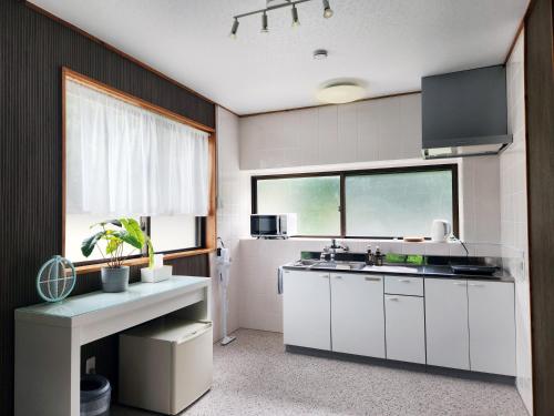 Kitchen, Casa Yamamoto by Griswood Hotels in Ie