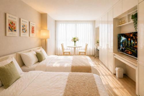 Value Stay Songdo 13층 공원뷰 루프탑 수영장 호텔침구 스마트TV 공항30분