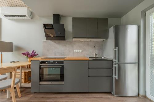 Villa Melli with hot tub and sauna in Lapmezciems