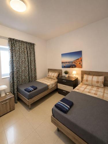 Private room in shared flat in central Sliema – khách sạn tại Khac
