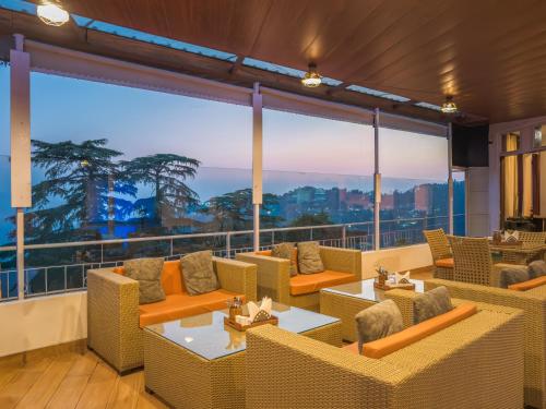 Restaurant, Tripli Hotels M & Resort in Dharamshala
