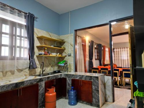 virtuve, Roseland Apartment in Lira