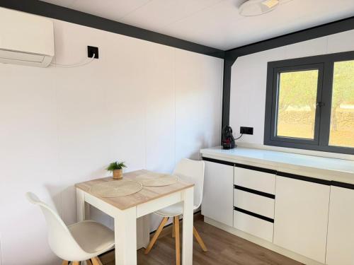 virtuve, Camping Ciudad del Ciclismo- Bungalow in Cervera del Maestre