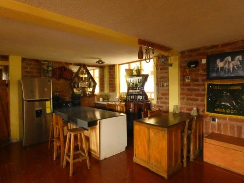 Pub/Lounge, Hostal el Vaquero in Chugchilán