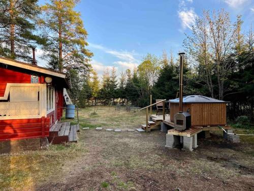 . An idyllic little summer cottage in the middle of the nature with Hot tub