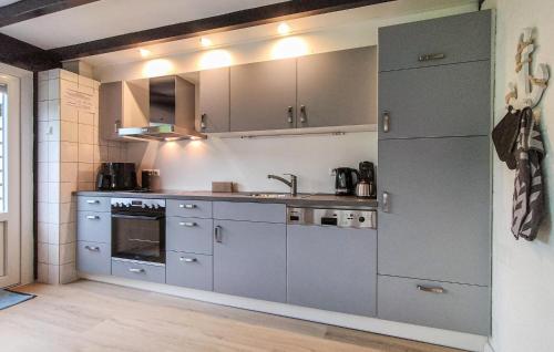 Kitchen, Nice Home In Stavenisse With Swimming Pool in Tholen