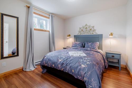 LEstran - 5BR3BA Spa View FP - Lower Unit in Petite-Riviere-Saint-Francois (QC)