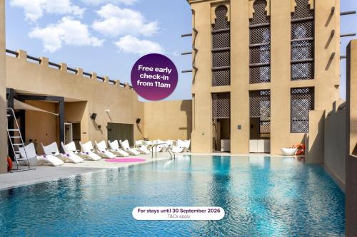 Swimming pool, Premier Inn Dubai Al Jaddaf - An Emirates Group Company in Al Jaddaf