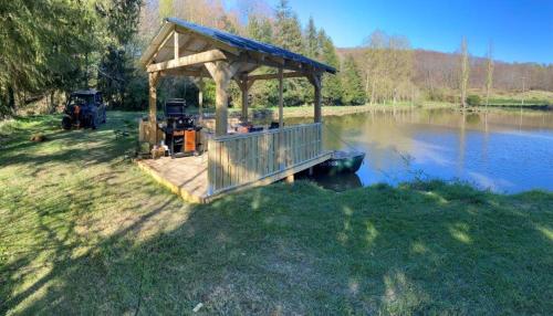 Mill House with leisure lake in Saint-Cyr-du-Bailleul