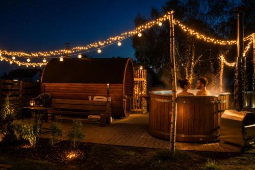 Drewniany Zakątek z sauną i jacuzzi (Drewniany Zakatek z sauna i jacuzzi) in Lochow