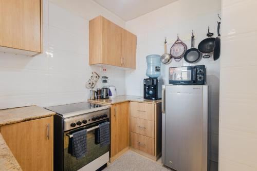 Chic City Apt with attached Private Bath 5km toUN in รูอากา