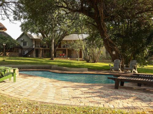 Jardí, Kruger Foothills Lodge - Near Kruger National Park in Hoedspruit