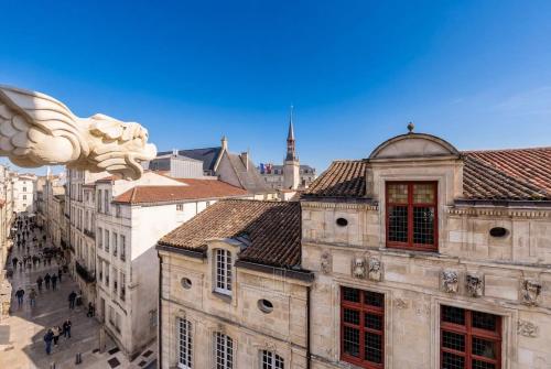 Duplex d'exception et charme au centre historique - image 2