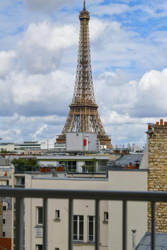 Spacious 2BR Apartment with Eiffel Tower View & Balcony