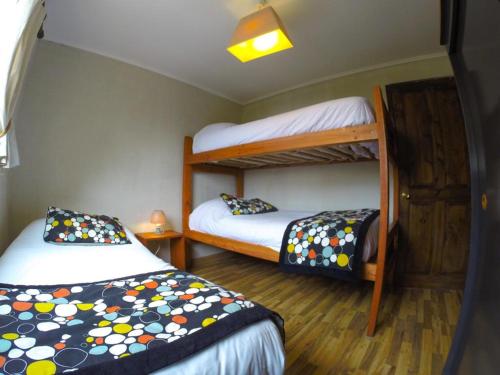 1 queen bed, 1 double bed, 2 bunk beds