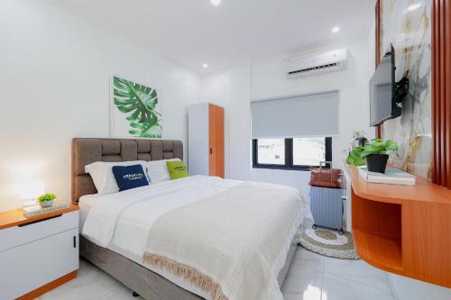 Kamar tidur, Urbanview Hotel Amira Syariah Bogor in Taman Sari