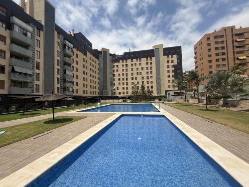 Apartamento con piscina, gimnasio y parking en Alicante by Turihome