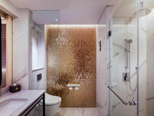 MOVENPICK SURABAYA CITY Room Type - Deluxe Double Room with City View MOVENPICK SURABAYA CITY Room Type - Deluxe Double Room with City View