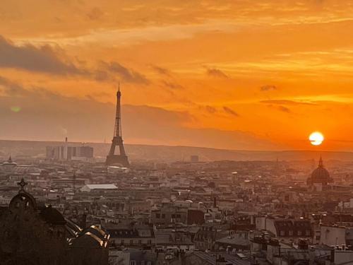 Eiffel Tower View from the Top Floor | Montmartre