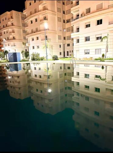 Appartement avec piscine in Gzennaia