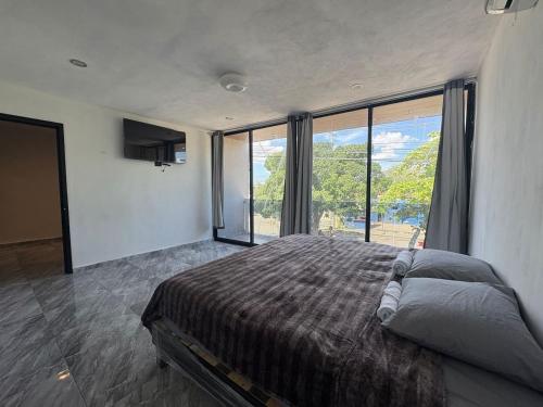 Casa privada Santa Isabel Piscina 8 personas – khách sạn tại Kanasin