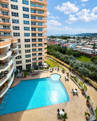 Swimming pool, Stylish One Bedroom Condo in Woodbrook