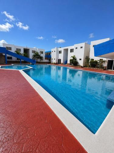 Swimming pool, Your Oasis on the Beach Pool and Grills in Chichiriviche