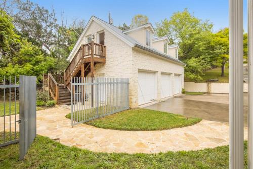 . Inviting Waterfront Home with Pool, Patio, Fireplace, W/D, & Dog-Friendly