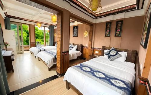 Huaqianshu Theme Inn 高铁免费接站或送站一次 in Xiangxi