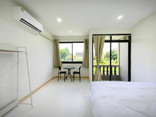 Exterior view of KoKo House, 500m the Pink Line MRT, Near Airport